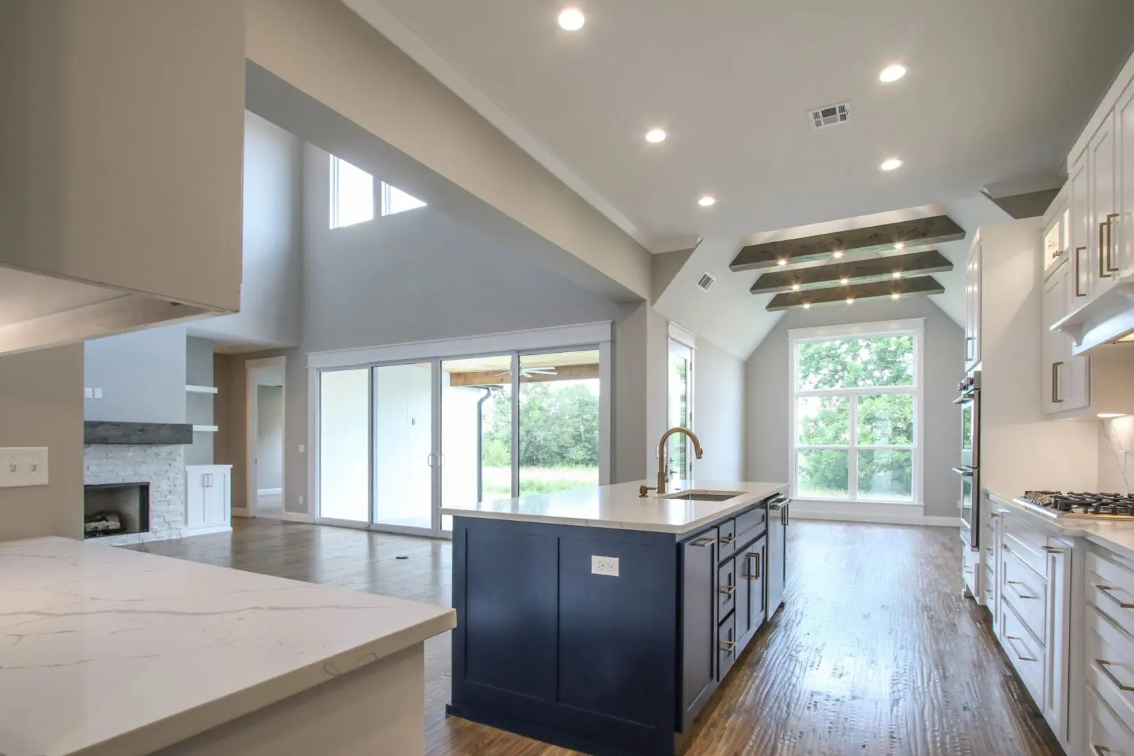 A large open kitchen with a big window