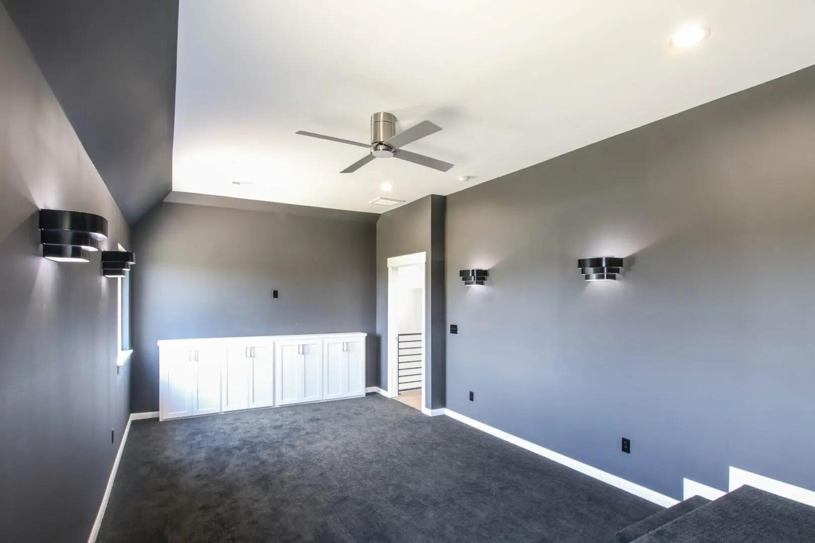 A room with grey walls and white trim.