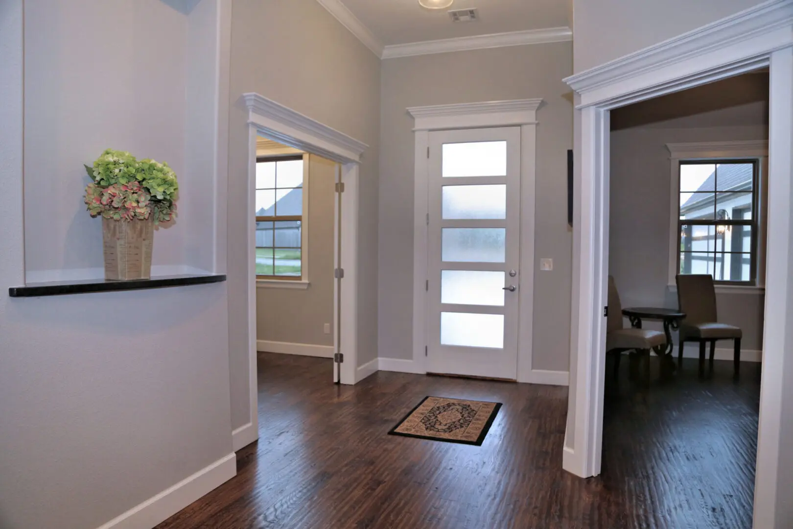 A door way leading to the living room and kitchen.